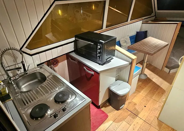 Sur L'eau Confort Hotel en barco